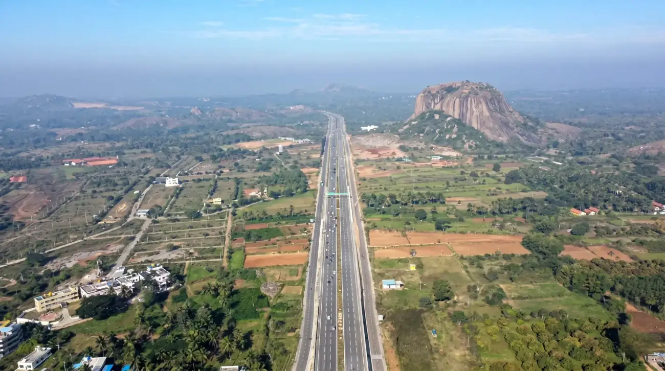 Aerial view of the Bengaluru–Mysuru Expressway near Alpha Wellness Resort